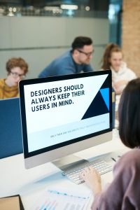 designer looking at design elements on screen