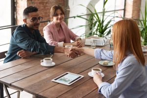 people seated on table for local networking