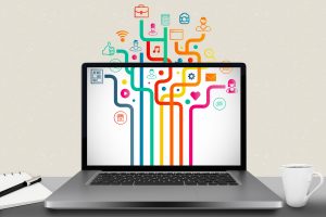 business application software Composite image of a laptop with graphic icons on the screen