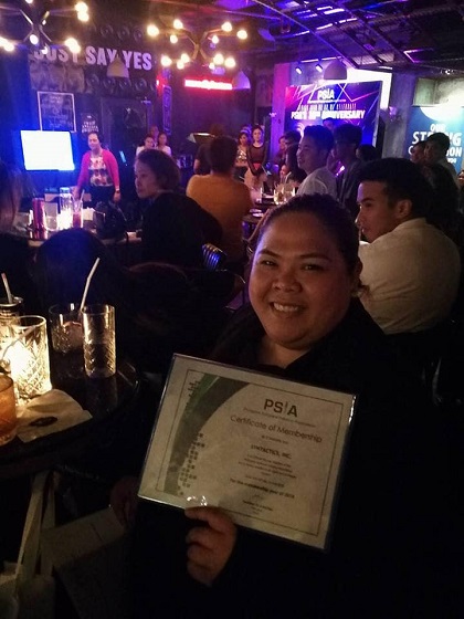 girl holding PSIA Certificate